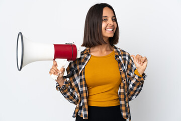 Young latin woman isolated on white background holding a megaphone and proud and self-satisfied