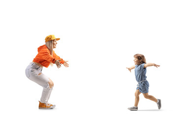 Full length profile shot of a little girl running towards a young female with arms wide open - obrazy, fototapety, plakaty