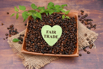 FairTrade Coffee: A wooden bowl with fair trade coffee.