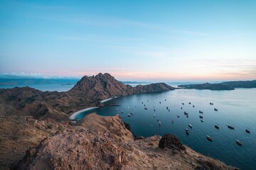 Naklejka premium Aerial view of rocky hill and the sea in Komodo national park Indonesia