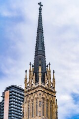 Fototapeta premium Vertical shot of the top of a historical church in Toronto, Canada