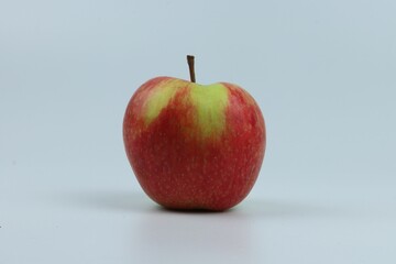 Closeup shot of a single apple on a white background.