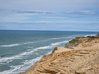 Beautiful view of the sea waves and rocky coast.