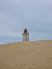 Famous Rubjerg Knude Lighthouse on the dunes in Denmark