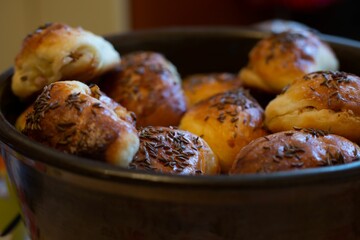 Closeup shot of a pot full of fresh baked buns