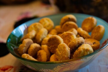 Closeup shot of a bowl with small cookies in it