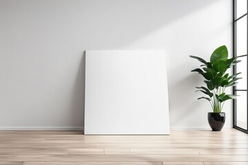 a blank poster stands next to the window on a wooden floor