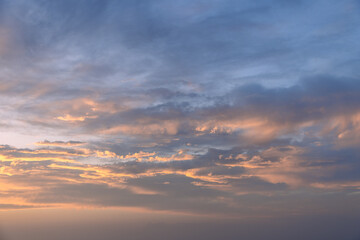 The evening sky, aglow with peach and blue gradients, offers a peaceful ambiance, ideal for...