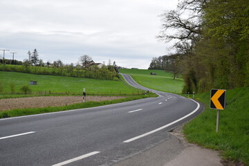 country road in rural Luxembourg during spring