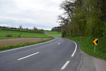 country road in rural Luxembourg during spring