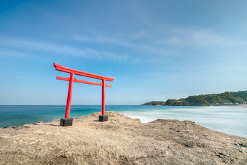 Red torii gate by the sea, Shimoda beach, Shizuoka Prefecture, Japan - 783646654