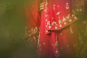 close up of thread work in lehenga - an indian bridal wear