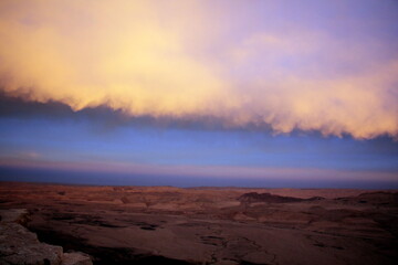 Lighting and color of the sky above the horizon at sunset.