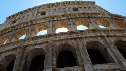 Low angle shot of the world-famous Colosseum in Rome, Italy - Powered by Adobe