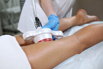Correction of the figure. Body care. Anti-cellulite therapy in a beauty salon. Hardware...
