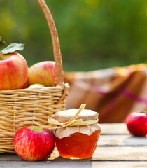 Apples in a basket on wooden table