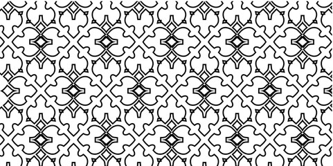 Decorative black and white seamless pattern with tulip and diamond shapes for creative design and cultural concepts