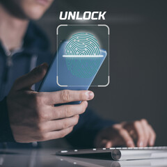 Teenager scan fingerprint to unlock the smartphone. Internet technology safety and privacy concept