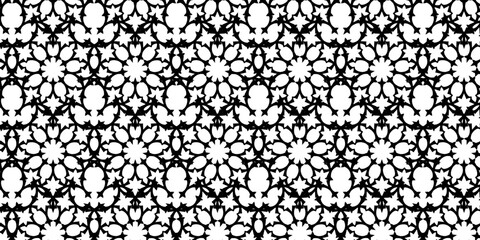Black and white ornamental pattern with intricate floral and star motifs for creative backgrounds and design concepts