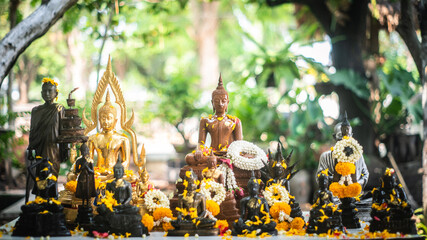 Songkran traditions in Thailand Thai Buddhists often take out Buddha statues in their homes and bathe them with Thai perfume and flowers on the first day of Songkran Festival.