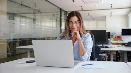 Happy busy mature business woman employee in office using laptop at work, smiling professional middle aged female company manager working looking at computer at workplace. - Powered by Adobe