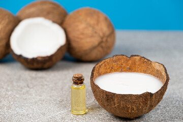 Coconut oil in a small glass bottle for skin and hair care.