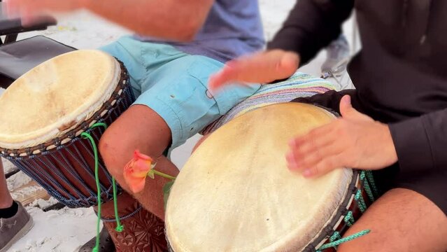 People playing drum outdoor