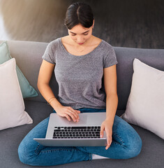 Lounge, girl and copywriter with laptop, remote work and relax on couch, blog or website and...
