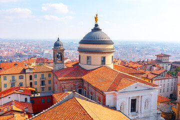 Panoramic view of the old town of Bergamo, Italy. Tiled roofs and cupola of Citta Alta in Bergamo, Lombardia