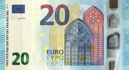 Fragment of one twenty euro money bill. Details of European union currency banknote of 20 euro...