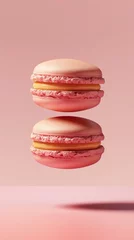 Foto auf Leinwand French macaron biscuit assortment on pastel pink background. minimalist colorful concept of macaroon sandwich cookie from France with copy space, flying and levitating © igorfrost