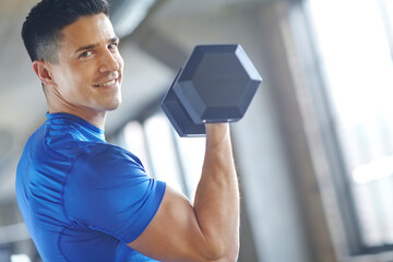 Portrait, bodybuilder or happy man with dumbbell in workout, training or exercise for grip power....