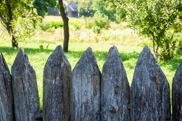 Wooden fence in countryside. Timber wood fence. Rustic farm