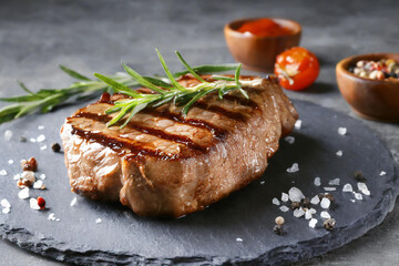 Ready grilled steak on cutting board - 783741285