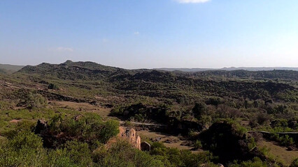 view of the mountains in autumn Rock Soil and stone Mountains Natural plants Trees Difficult roads Roads Hills Peaks Historic sites Old forts Walls Blue sky Herbs Fog Cold