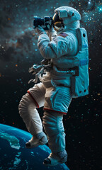 Fototapeta premium Full body astronaut Camera man in outer space holding his camera. close up.
