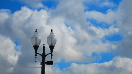 clouds and sky and street light - obrazy, fototapety, plakaty