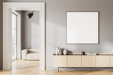 Gray living room interior with dresser and square poster