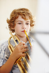 Thinking, music and child with trumpet for practice, lesson and learning for talent show. Musician,...