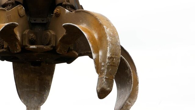 Loading crane for waste disposal. Lifting crane in the form of tongs.
