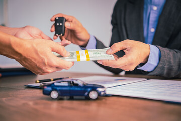 Car dealers facilitate insurance finance agreements, ensuring safety and security for clients....