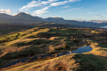 Stunning, Spring sunset landscape aerial drone image in Lake District looking towards Old Man of Coniston - 783775824