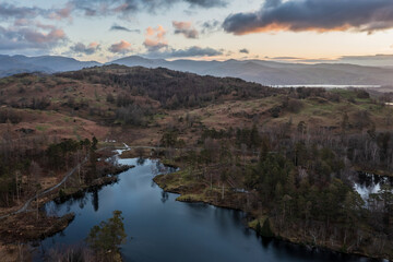 Beautiful, aerial drone landscape image of Lake District during Spring vibrant sunset - 783776210