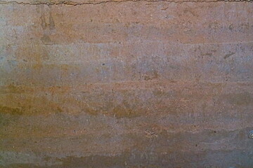 Rammed earth wall texture background 