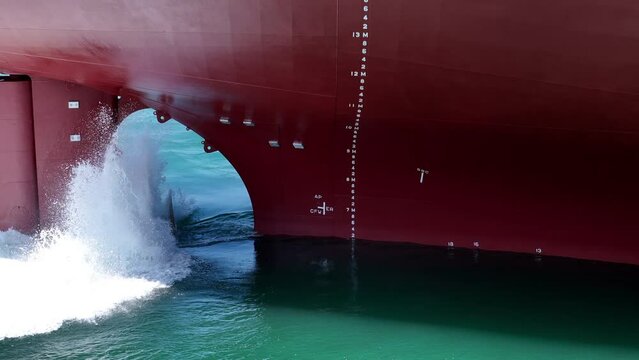 Propeller of large ship spinning power working and water splash contrail . Close up image detail Stern back of Vessel ship, Logistics Transportation industry express technology Freight 
