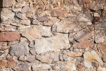 Very old stone wall, perfect for background.. Barcelona, Catalonia, Spain.