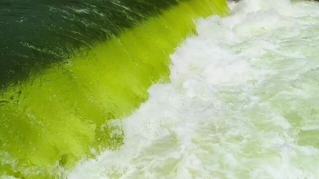 Highspeed river running and water falls at Check dam near Krishna Raja Sagara dam or KRS dam across the Kaveri River at Indian State of Karnataka. Construction began in November 1911 & 10,000 workers.