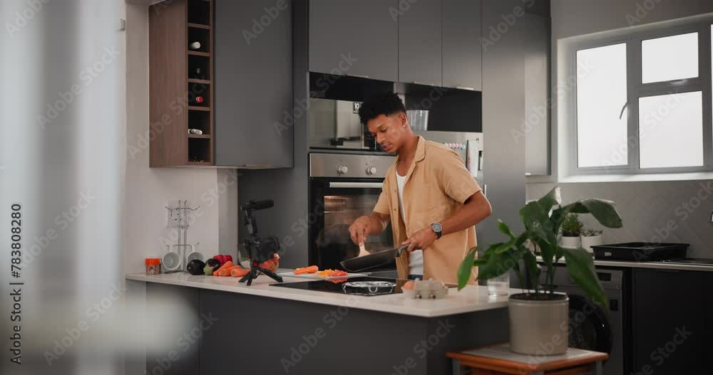 Poster influencer, man and cooking in kitchen or streaming with camera for food vlog and content creation. 