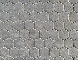 Hexagon outdoor paving stone tiles, paving cobble stone in grey natural stone color.