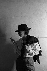 woman in black and white smoking